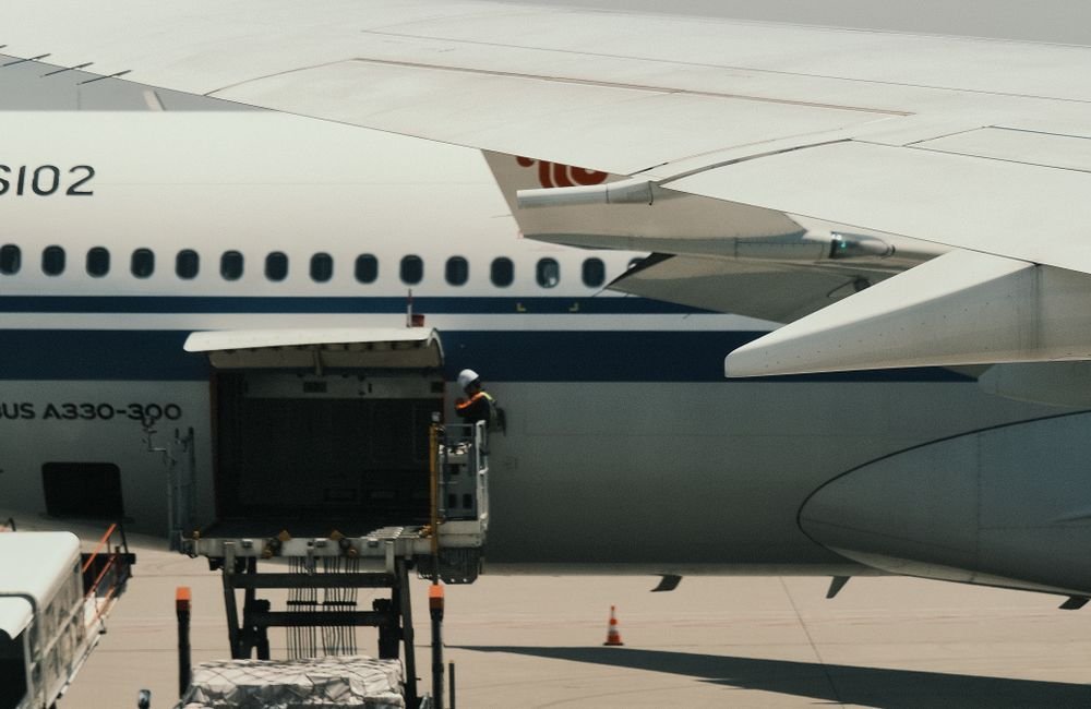 Air freight cargo being loaded onto a GlobalDash Express aircraft