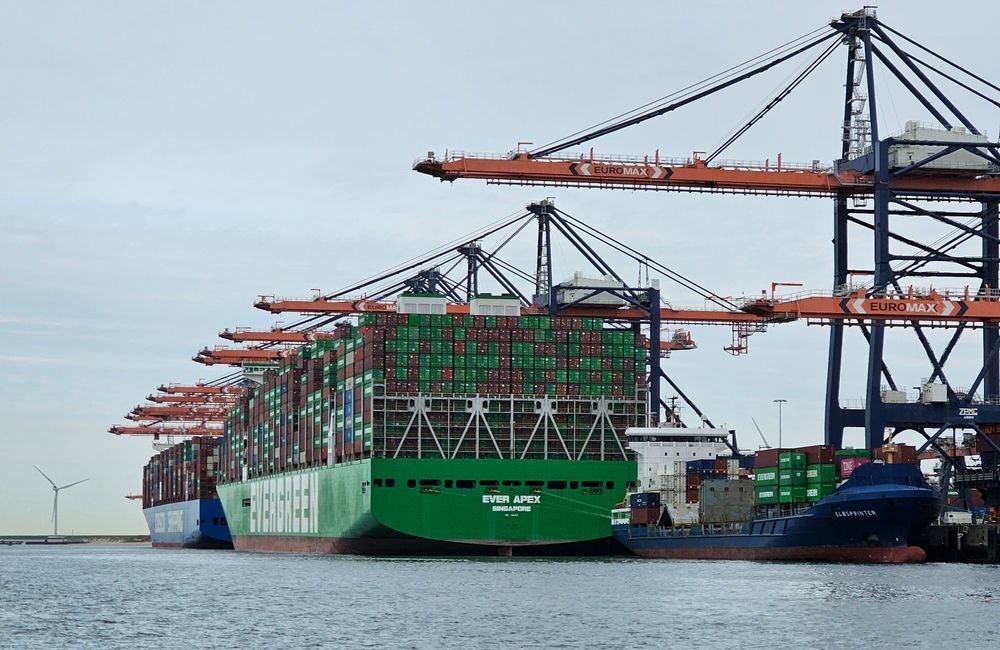 Container ship at port loaded with freight and cargo