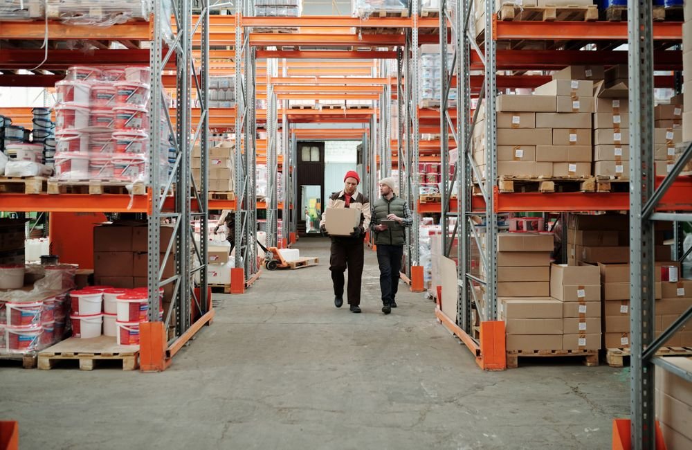Warehouse aisle with racked shipments ready for e-commerce fulfilment